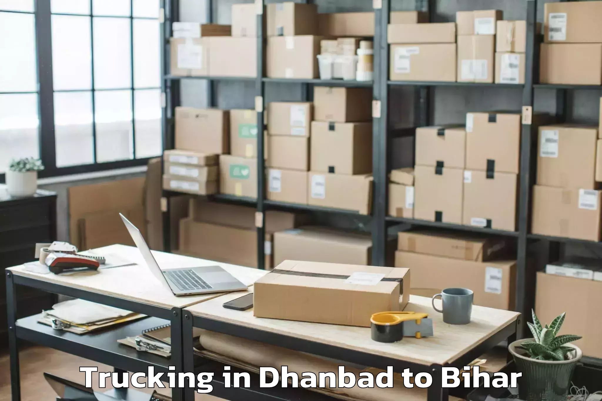 Easy Dhanbad to Bela Trucking Booking